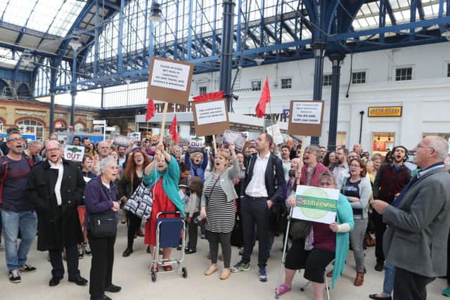 A public demonstration of anger at Brighton Station. Eddie Mitchell